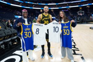 Deyna Castellanos y Stephen Curry